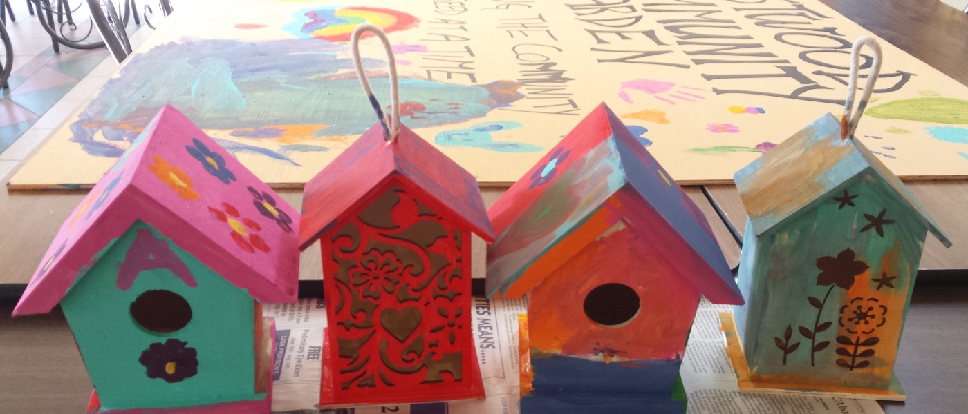 Hand painted bird houses at Westwood Place housing co-operative