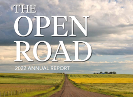 Photo of a long country road with text The Open Road 2022 Annual Report