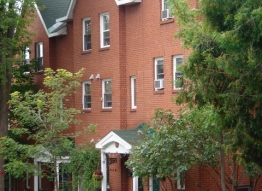 Photo showing the front of some buildings at Sandy Hill Housing Co-op